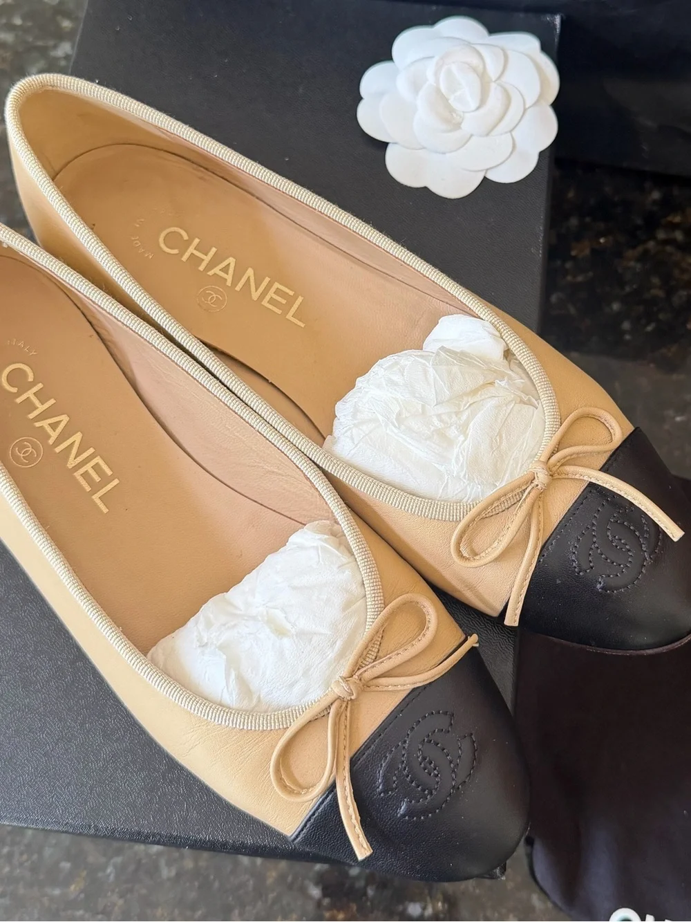 CHANEL Two-Tone Tan and Black Leather Cap-Toe Ballet Flats